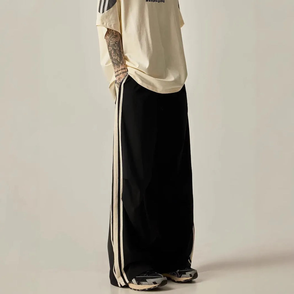Men's black wide-leg climbing trousers with high waist and straight-leg design