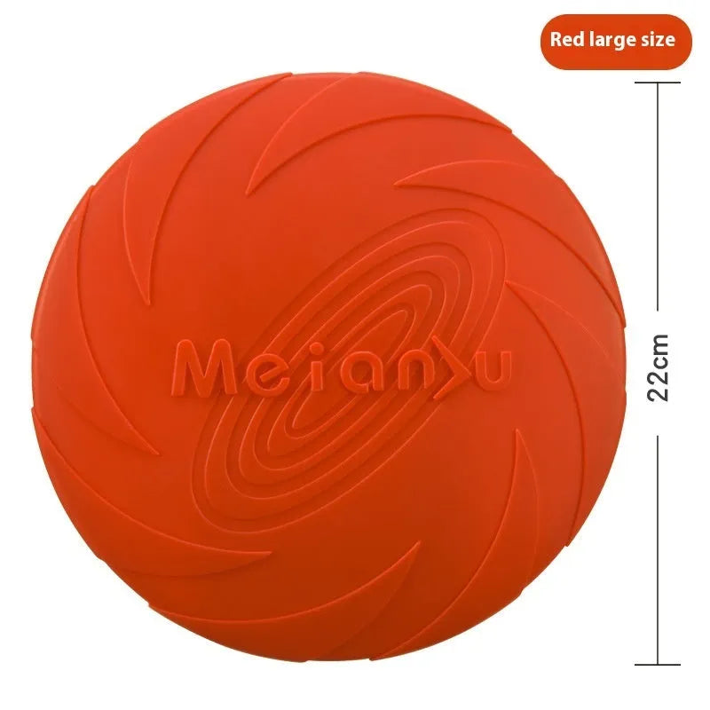 Dogs Base soft rubber dog frisbee toy in red, blue, and green colours shown in small, medium, and large sizes.