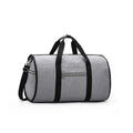 Cylinder-shaped travel bag in red colour with zipper closure and carrying handles