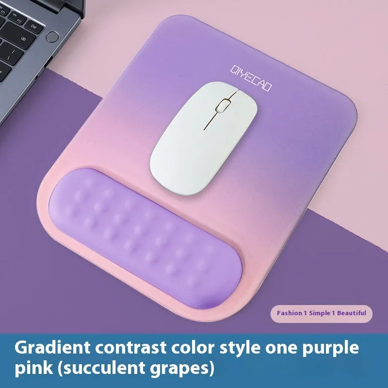 Ergonomic cloth silicone mouse pad with raised wrist support in mint green colour.