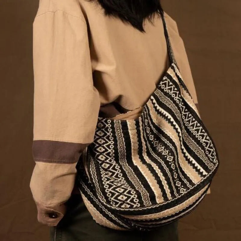 Corduroy vintage striped messenger bag with adjustable shoulder strap and zip closure