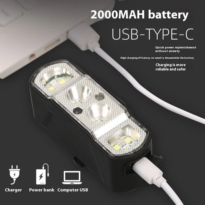 Black bicycle headlight with LED, showing mounting bracket and rechargeable battery.