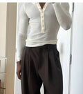 Men's cream-coloured ribbed cotton henley top with 3-button placket and long sleeves