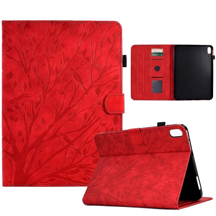 Black imitation leather tablet case with Pachira macrocarpa engraving and built-in viewing bracket open.