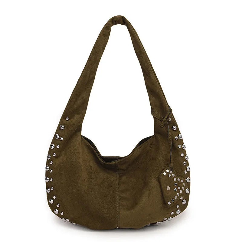 Soft plush retro style tote handbag for women in a choice of colours, shown as a strapless design.