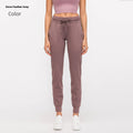 Women's high waist yoga pants with drawstring waistband in quick-drying cotton blend fabric, multiple colour options