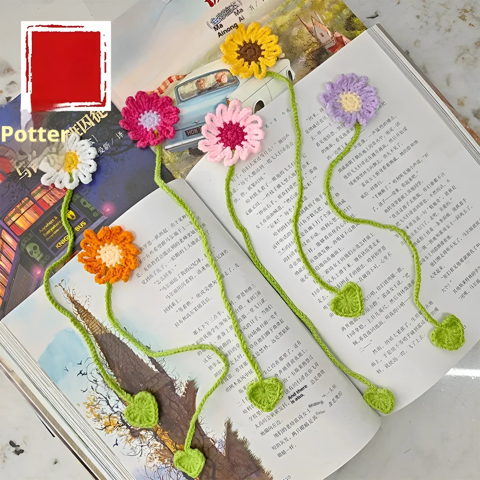 Hand-crocheted wool bookmark with flexible wire core and little daisy design in milk cotton yarn