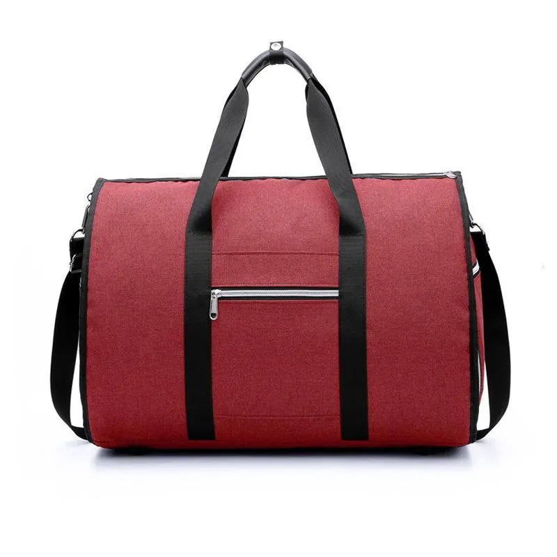 Cylinder-shaped travel bag in red colour with zipper closure and carrying handles