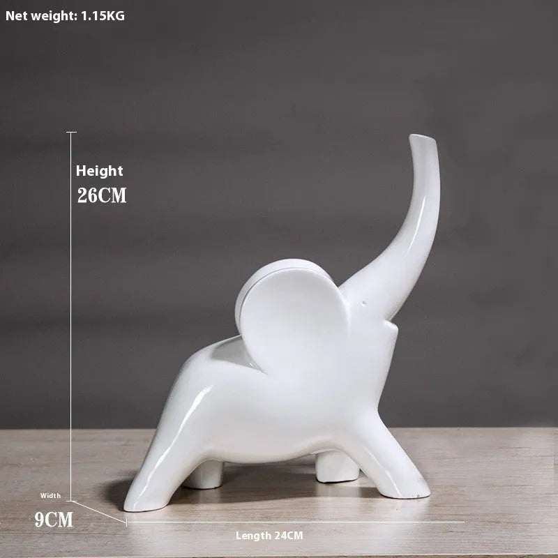 Minimalist rose gold and white resin elephant ornaments on a shelf, showing large and small sizes.