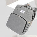 Portable folding mummy bag in multiple colours with curved shoulder strap and USB interface
