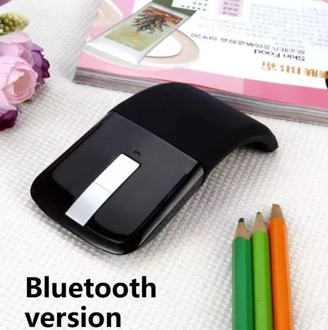 Black Bluetooth 4.0 folding touch wireless mouse shown in compact and folded position.