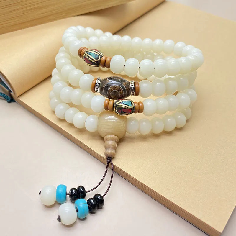 White Jade Bodhi bracelet with 108 beads showing three different style pattern options