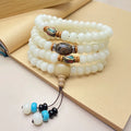 White Jade Bodhi bracelet with 108 beads showing three different style pattern options