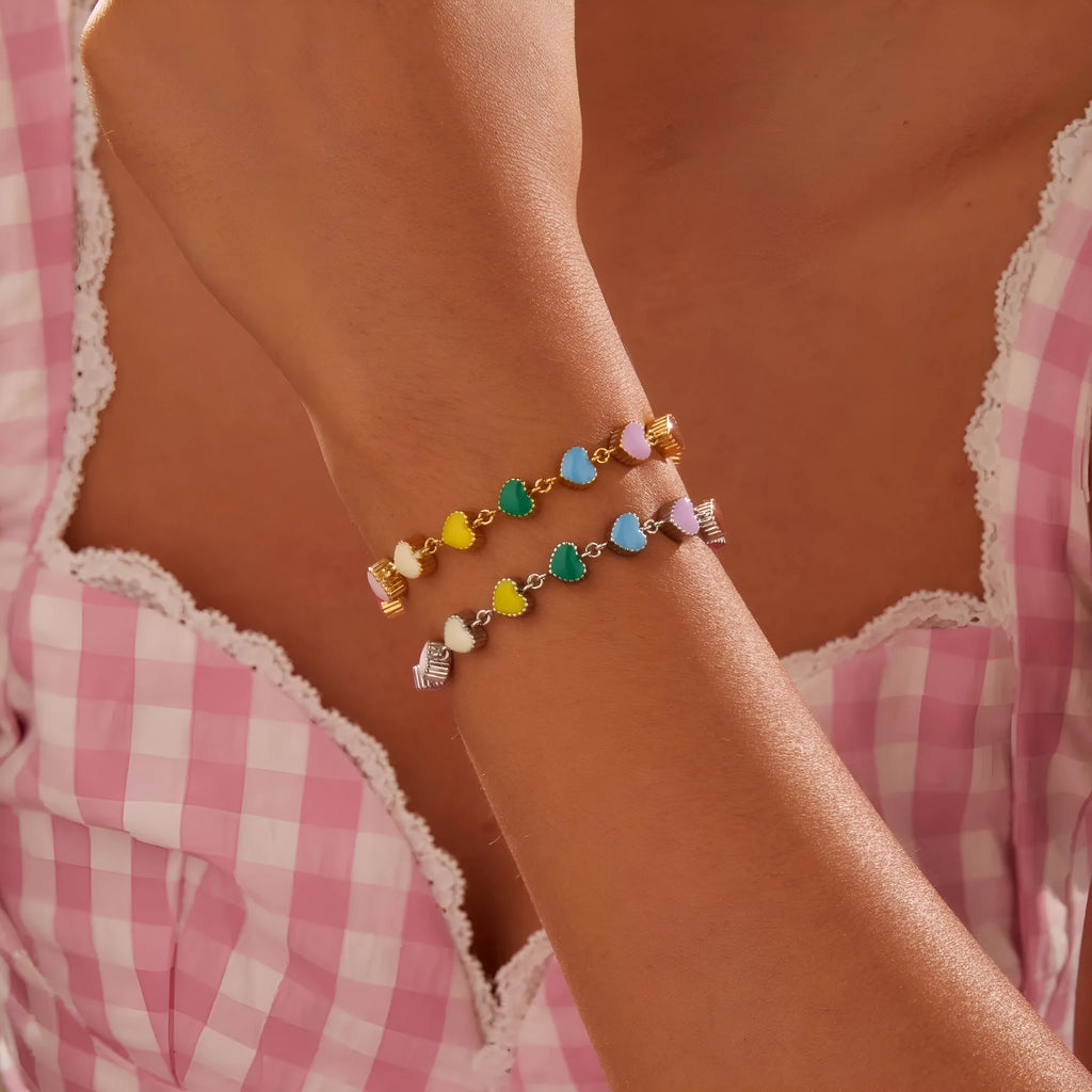 Gold or steel coloured heart-shaped titanium steel bracelet with electroplated finish for women's fashion wear