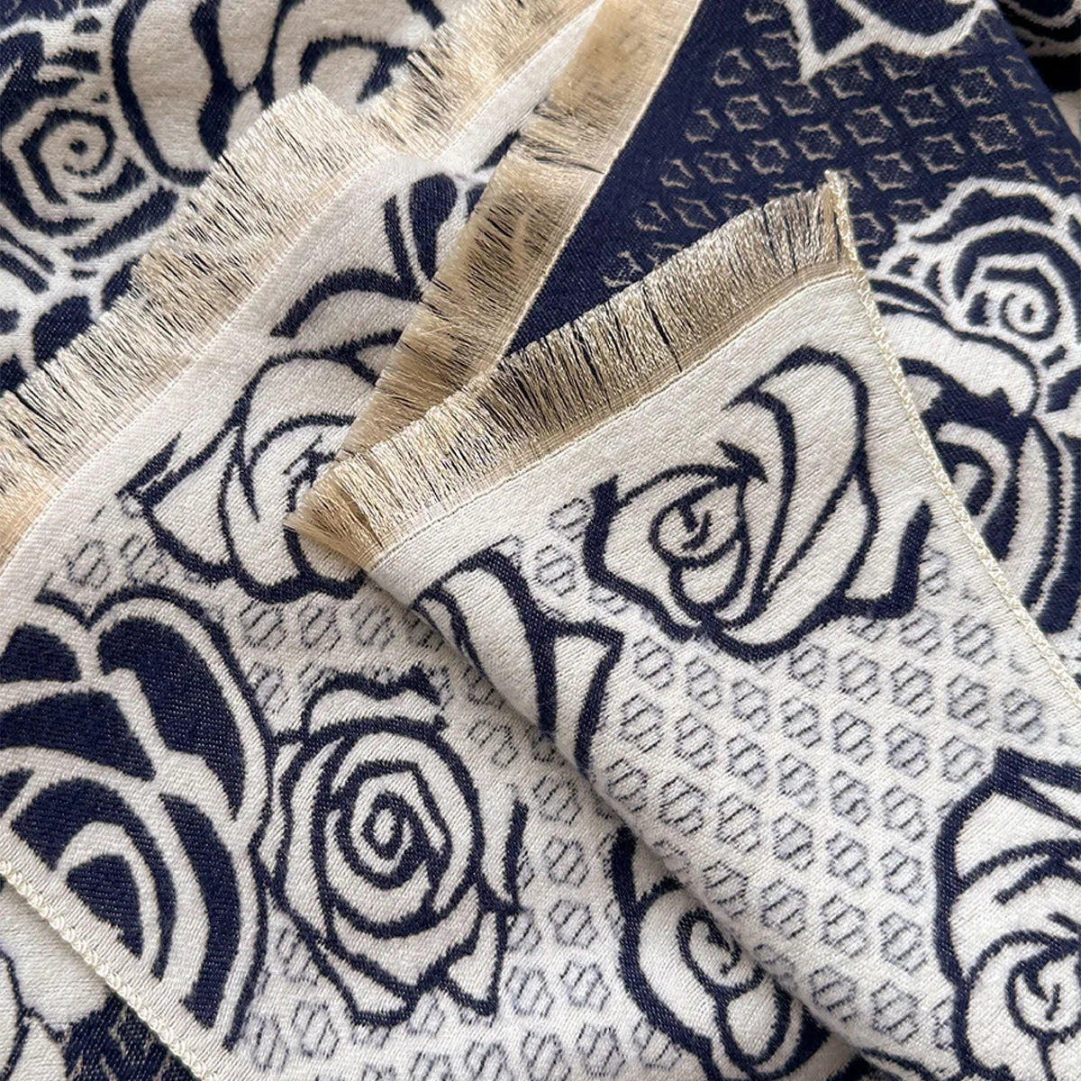 Long grey imitation cashmere winter scarf with tassels, shown draped