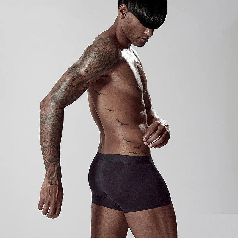 Seamless modal men's underwear in mid waist design showing white, pink and green colour options