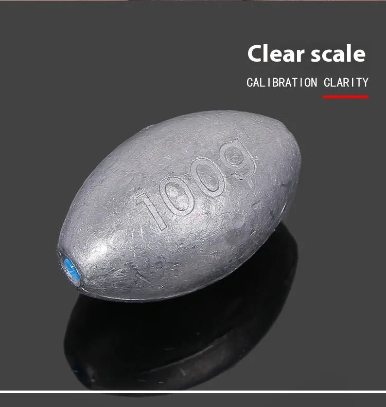 Tongxin olive-shaped rugby lead sinker for sea fishing with scale texture, showing plastic core construction.