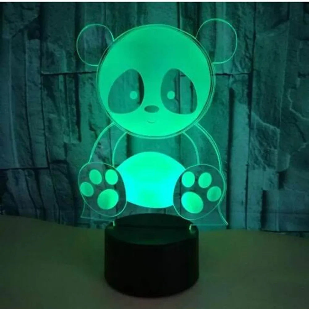 Panda-shaped acrylic night light with remote control displaying multiple colours on a black ABS base.
