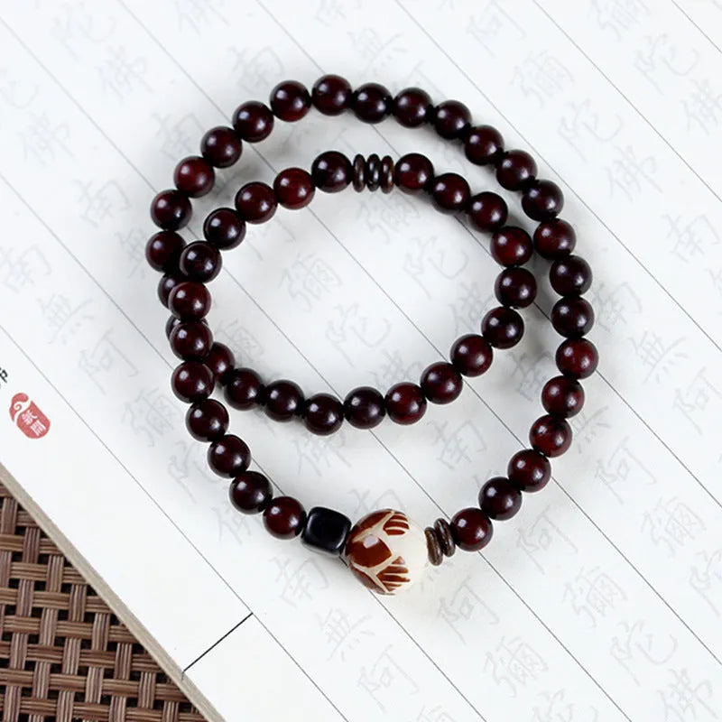 Natural rosewood double-ring bracelet with floral shape measuring 10mm wide, hand-knitted construction