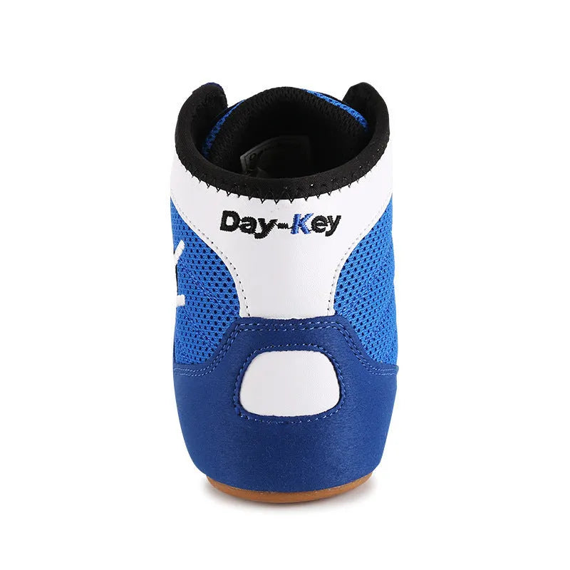 Breathable mesh wrestling boxing training shoes in red and blue with lace-up closure
