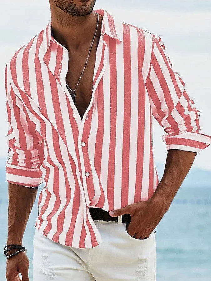 Man wearing a grey and white striped loose-fit long-sleeved casual shirt