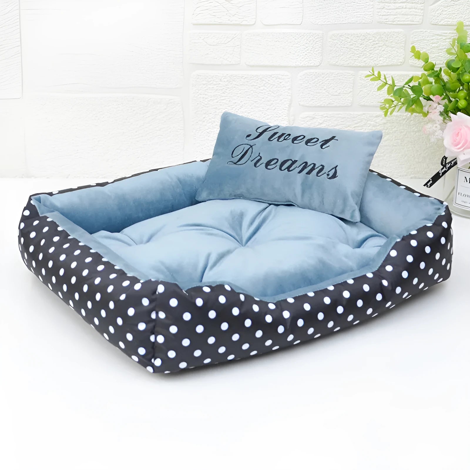 Polka dot printed square nest dog bed with removable embroidery pillow in grey, blue, pink, or red.