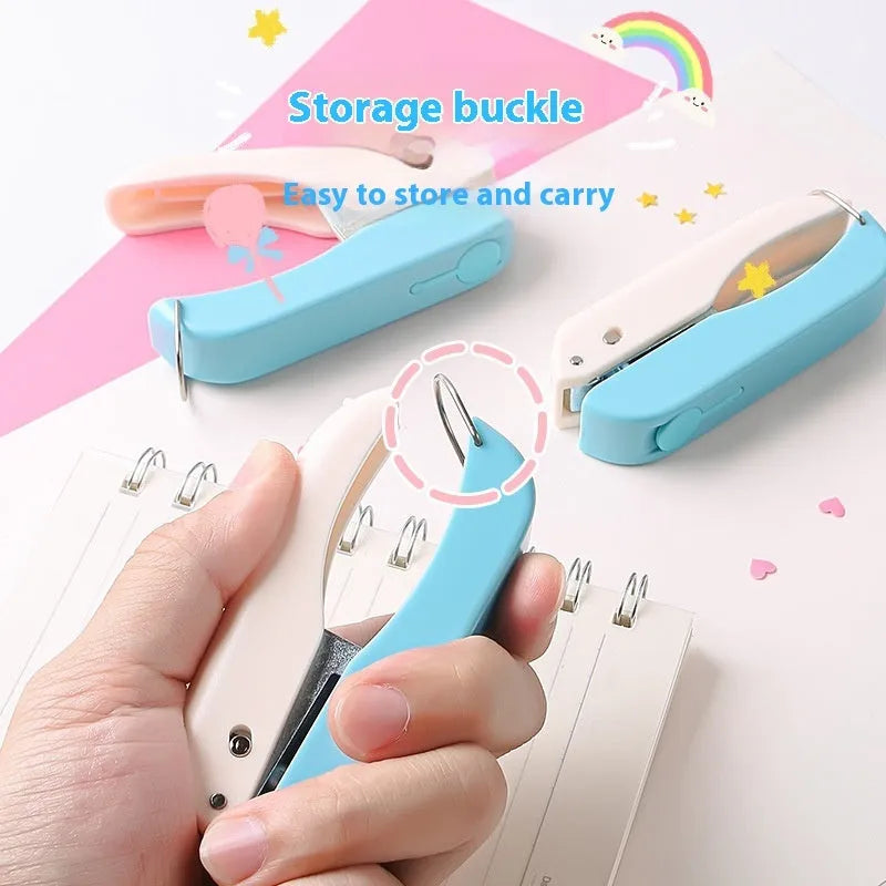Small manual punching machine for creating love heart, star, and round embossed paper shapes.