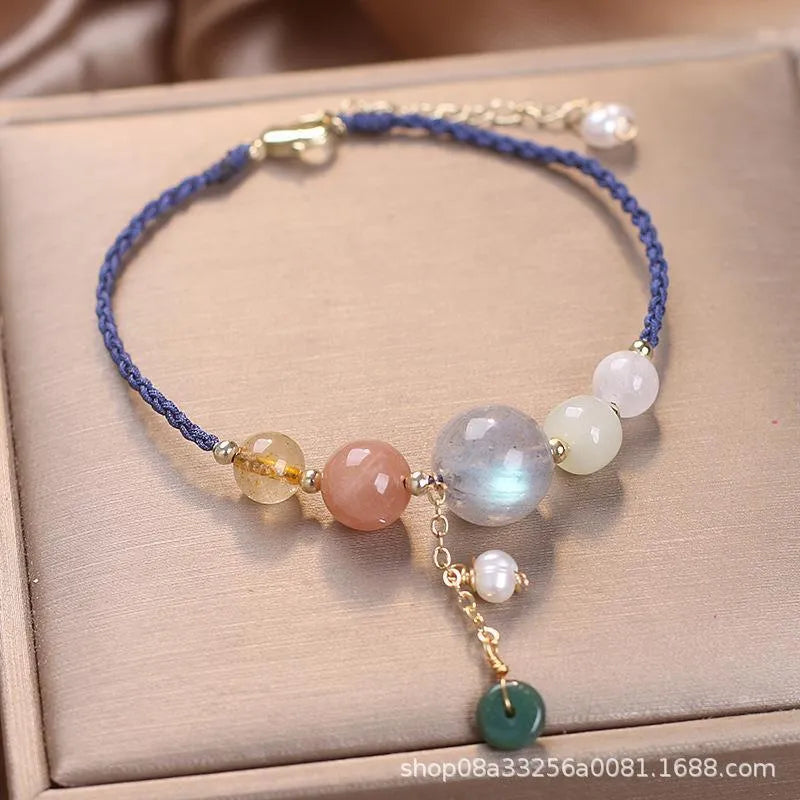 Hand-woven crystal bracelet with sequin details and adjustable buckle in three colour options