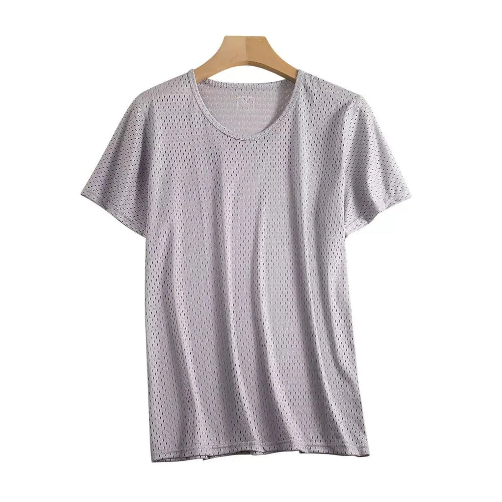 Man wearing a thin grey Ice Silk short sleeve crew neck t-shirt with a loose fit.