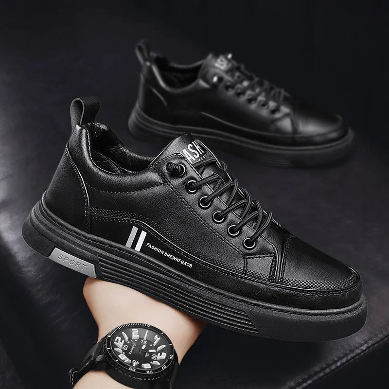 Men's white and black low-top skateboard shoes with elastic band fastening and rubber sole.
