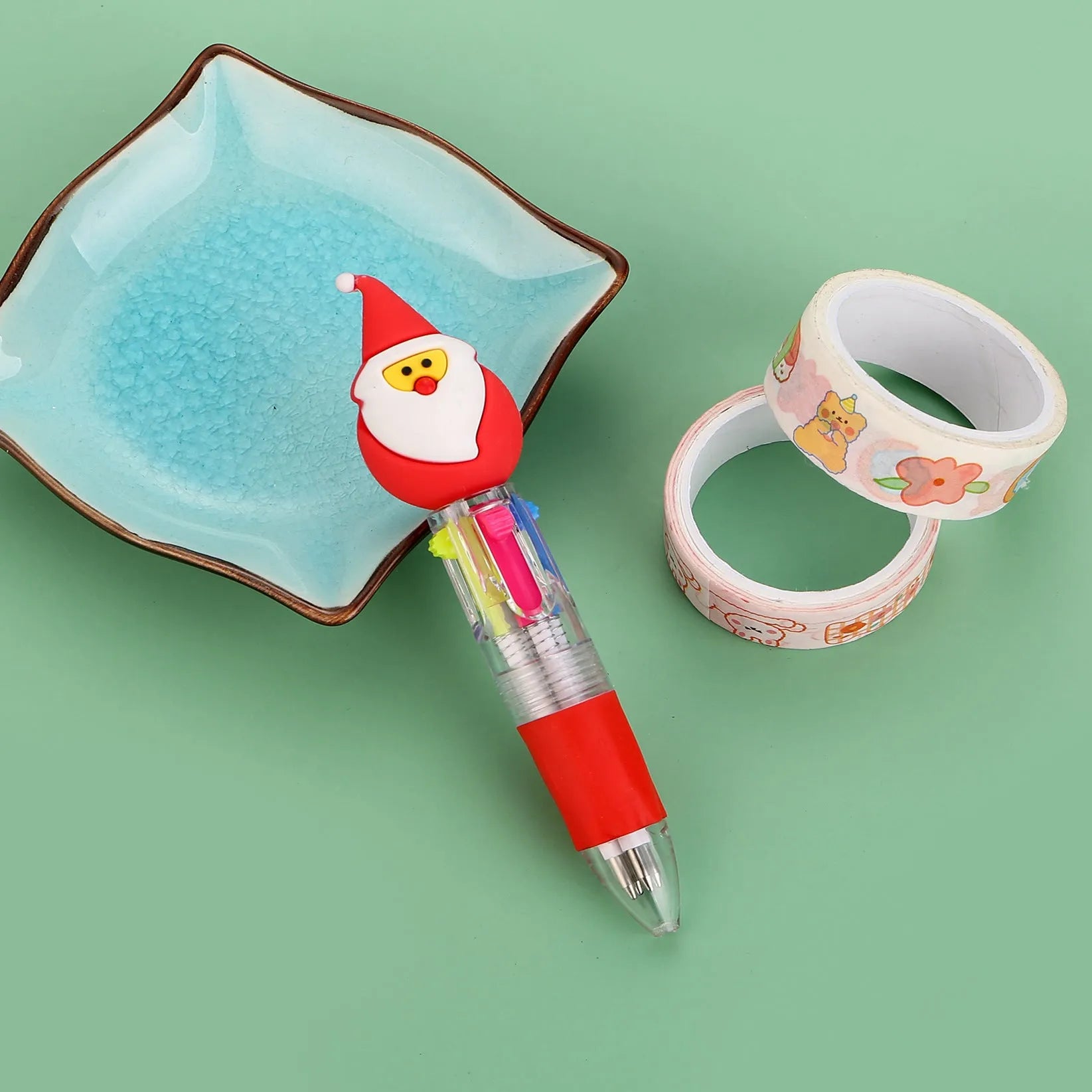 Compact 11cm Christmas four-colour ballpoint pen with press mechanism in festive designs