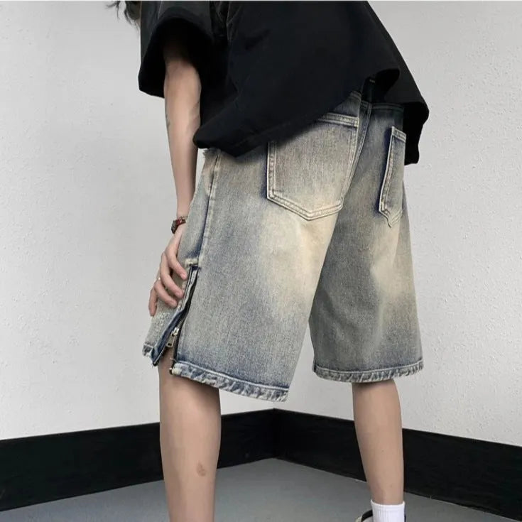 Blue retro denim shorts with tattered detailing and wide leg cut for summer wear