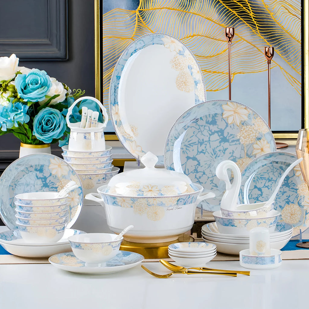 16 piece new bone china dinner set with bowls plates spoons and chopsticks on a table