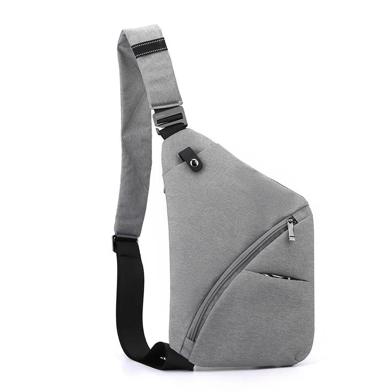 Men's grey oxford cloth shoulder chest bag with letter pattern, shown in left shoulder configuration