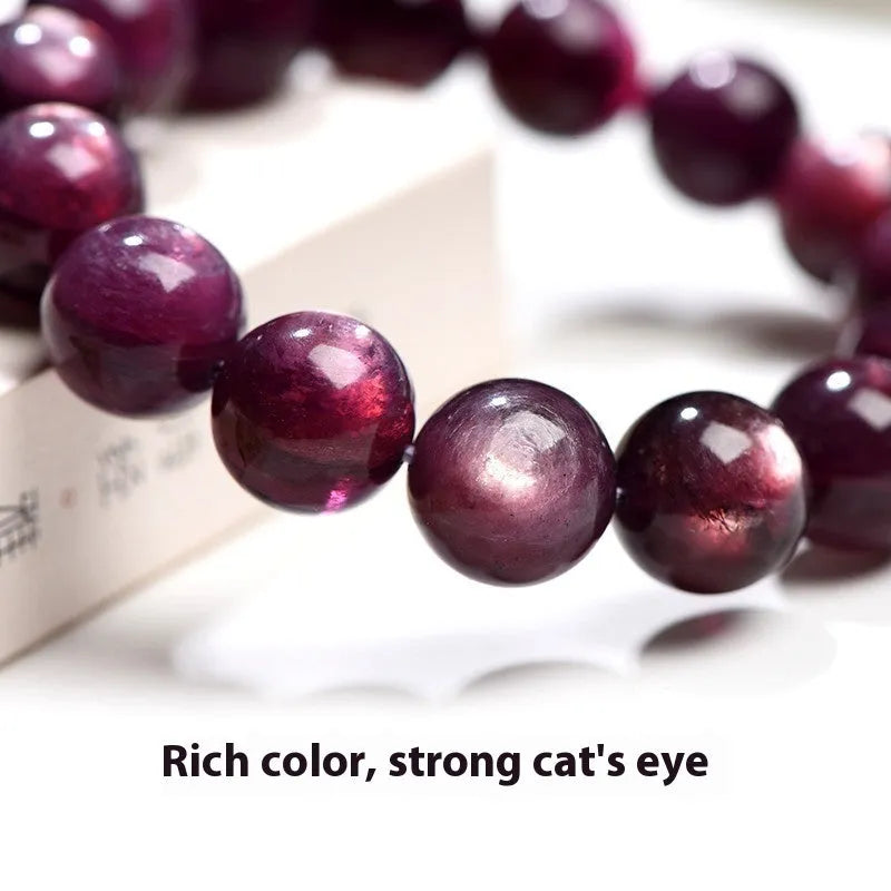 Natural purple lepidolite crystal bracelet with polished round beads in circular geometry