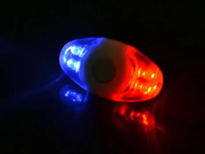 Red and blue 4 LED tail light with adjustable base for bicycle safety