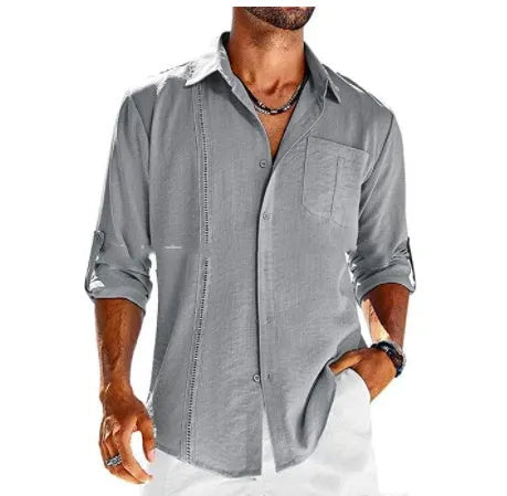 A man's solid-colour long sleeve casual shirt with a polo collar, button front, and chest pocket.