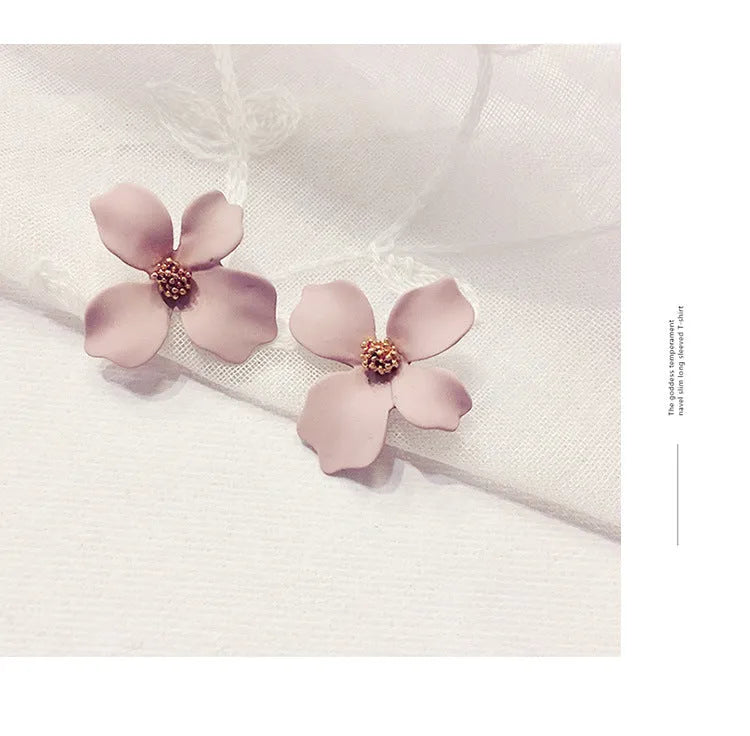 Flower stud earrings for women in alloy with white and pink electroplated colour options