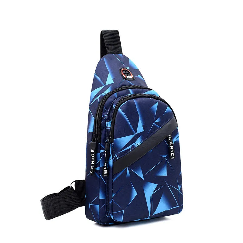 Men's blue Oxford cloth crossbody sling bag with earphone hole design showing zipper opening and letter print detail