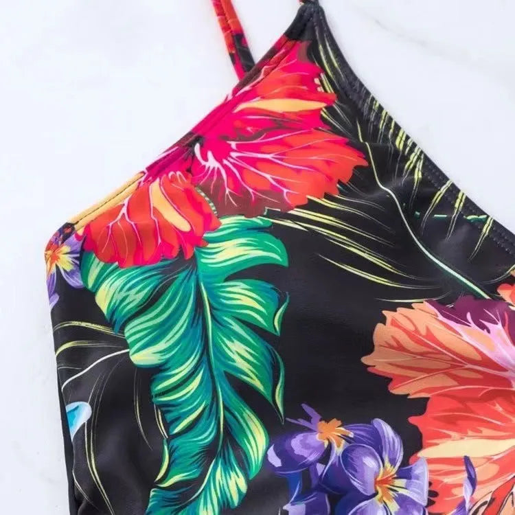 Black women's high waist briefs with a printed split bikini design for swimming and sports.