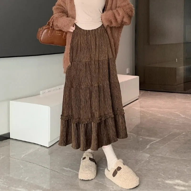 Corduroy A-line midi skirt with elastic waistband in milky white colour showing Korean style design