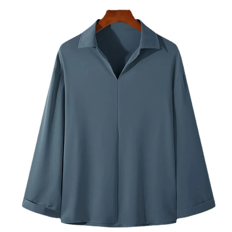 Men's loose lapel casual long sleeve shirt in solid colours on a hanger