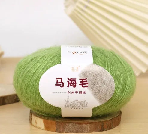 Mohair wool ball for DIY scarf knitting in assorted colours on white background