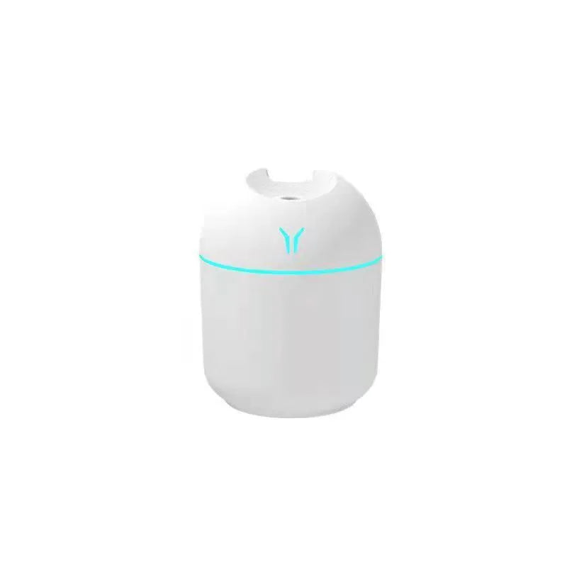 Round desktop humidifier in ivory white colour with USB cable and 250ml capacity marking