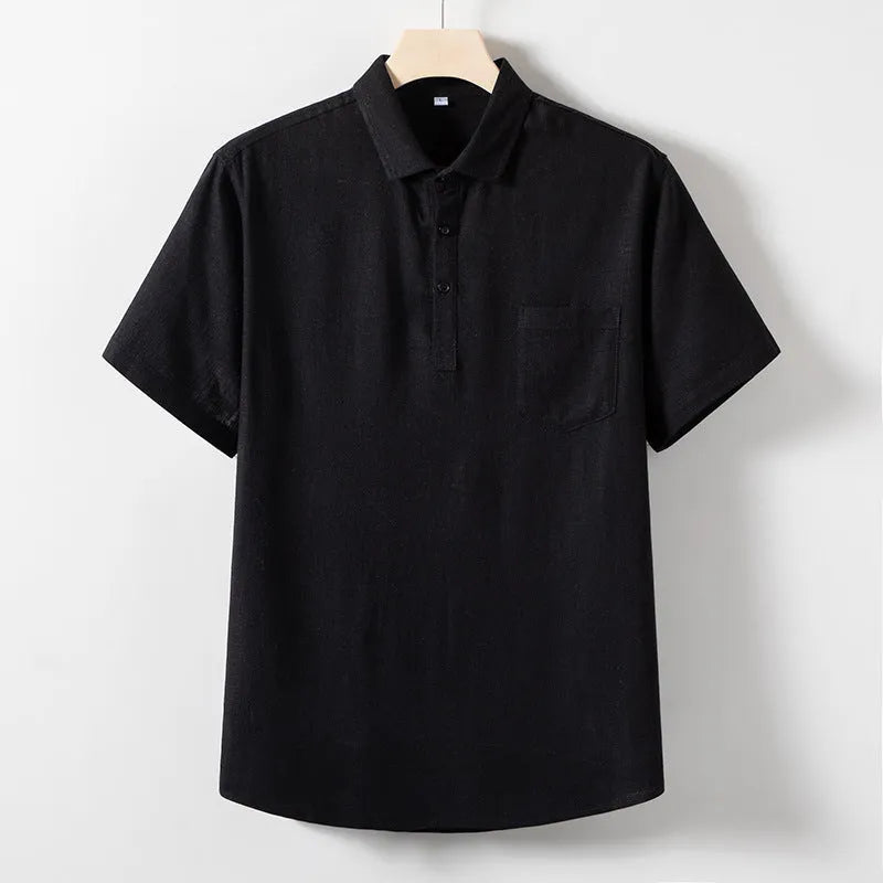 A man wearing a loose-fit linen-blend t-shirt in a solid colour with a relaxed lapel and short sleeves.
