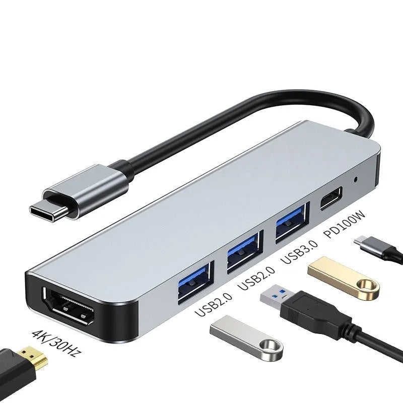 Compact aluminium USB-C expansion dock for laptop and tablet showing multiple port options.