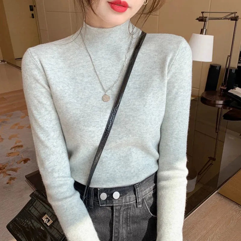 Slim fit long sleeve knitted top in viscose fibre available in multiple colours with Western style design