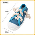 Plastic dog slipper chew toy in yellow, black and blue colours with textured bends for dental cleaning