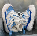 Women's chunky platform sneakers with 6-8cm heel in grey, showing round toe and front tie-up closure