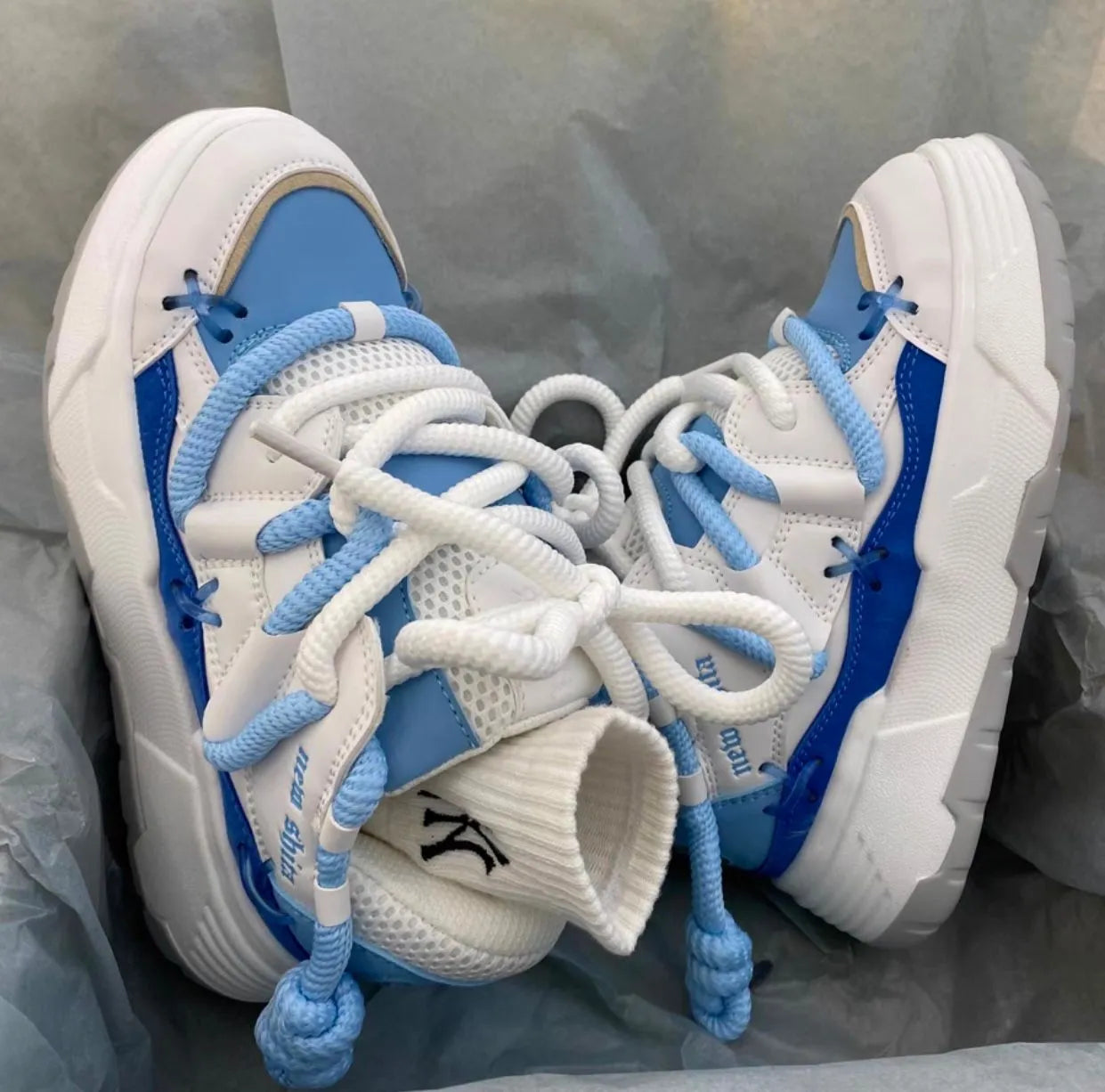 Women's chunky platform sneakers with 6-8cm heel in grey, showing round toe and front tie-up closure
